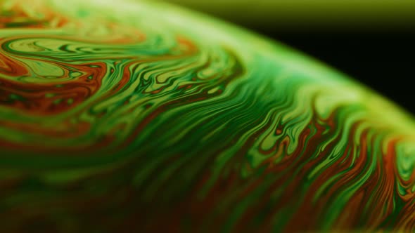 Closeup Abstract Shot of Soap Bubbles with Wavy Swirls on the Surface