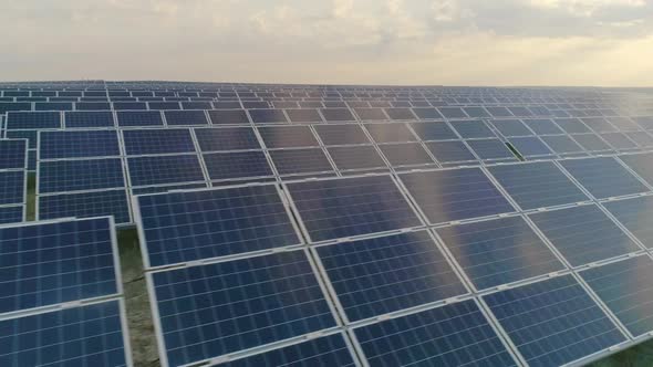 Drone View of Renewable Solar Energy Station with Panels Standing in Rows. Concept of Green Eco