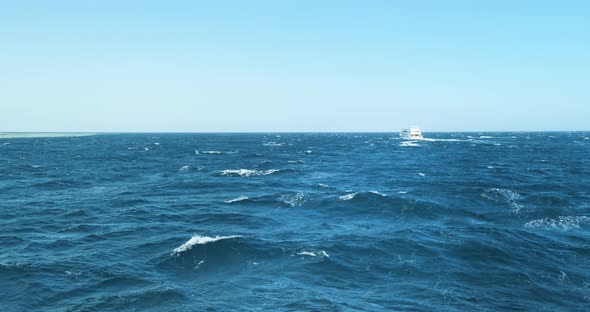 Azure Sea with Waves on Sunny Windy Day