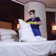 Hotel Maid in Mask and Gloves Changing Bed Linen - VideoHive Item for Sale