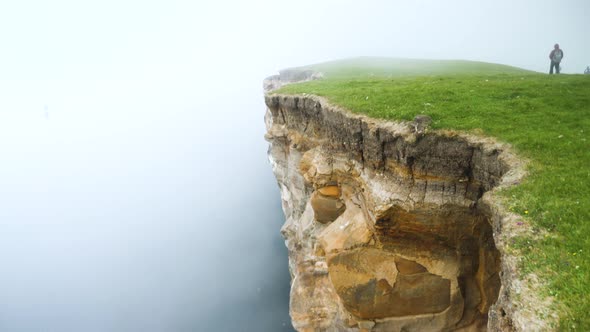 Beautiful View of Foggy Traelanipan Slave Mountain in Vagar Faroe Islands