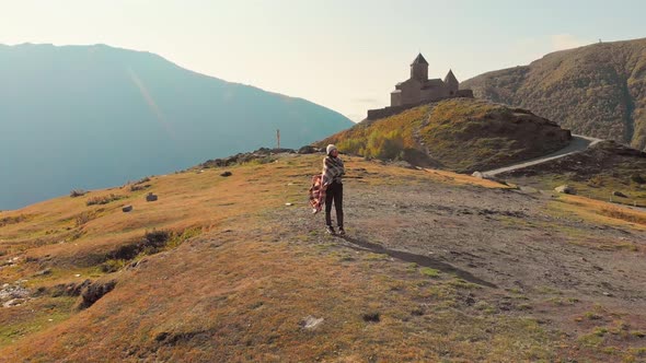 *Revealing View Of Female Tourist Sightseeig In Georgia