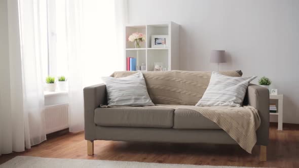 Sofa with Cushions at Cozy Home Living Room 5