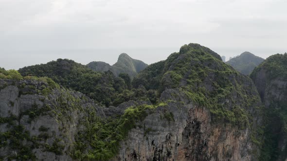 Drone Shot Flying Through the Mountains of Tropical Island