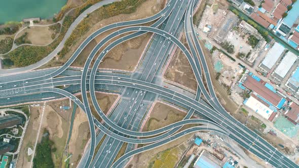 Top View to the Cars Driving on Multilevel Highway on the Sunset