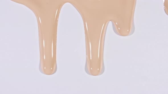 Foundation for Face Smear Concealer Cosmetic Liquid Foundation or Cream Beige Color Smudge Flowing
