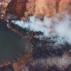 Aerial View of a Natural Disaster - Burning Grass, Air Pollution, Smoke Over a Fire - VideoHive Item for Sale