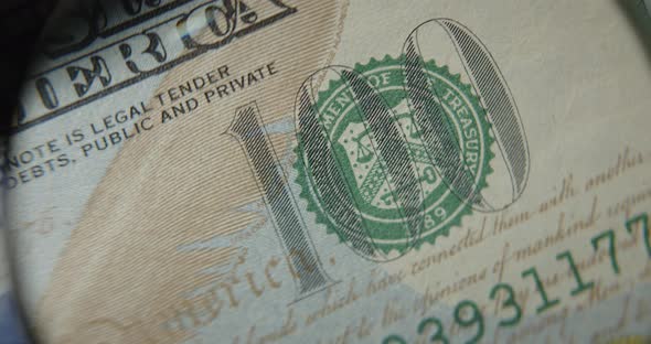 Macro Of One Hundred American Banknotes. Banknotes Through A Magnifying Glass.