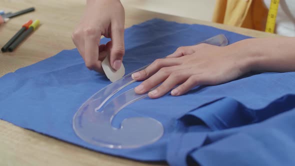 Close Up Of Female Designer's Hands Create A Template Of The Future Dress