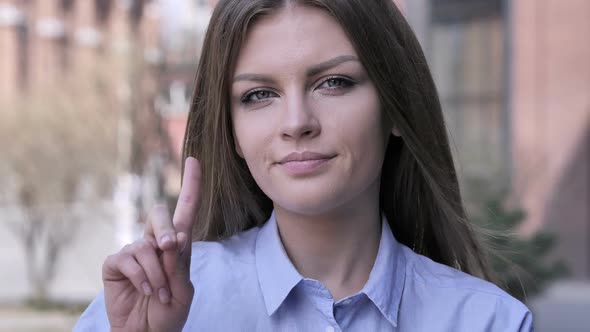 No Young Woman Rejecting Offer By Waving Finger