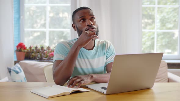 Freelancer Man Developing Startup Project at Home Office