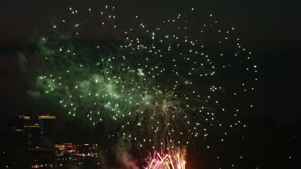 Beautiful fireworks over a city in the night