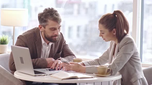 Office Workers Talking at Coffee Shop