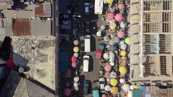 Crowd of people and cars at Accra Central Market (Makola)_11