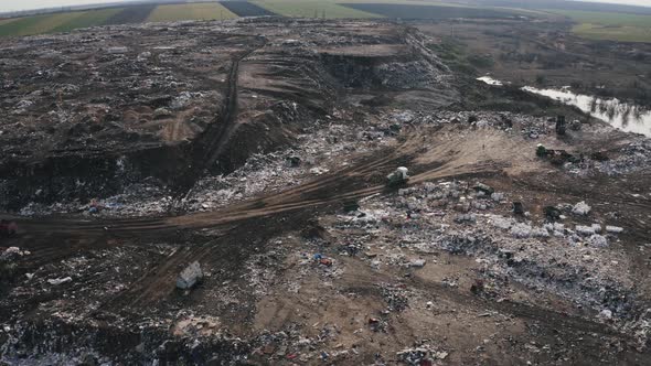 Aerial View on City Rubbish Dump with Flocks of Seagulls