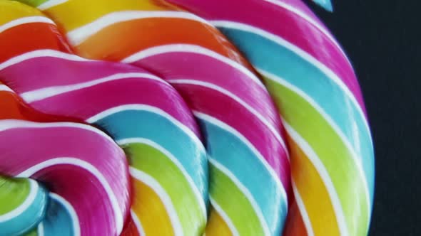 Background of Striped Spiral Multicolor Lollipop