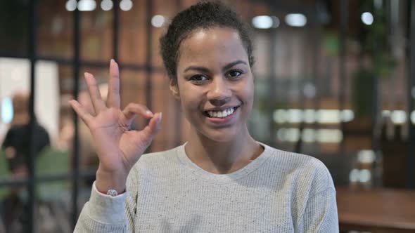 Ok Sign By Satisfied African Woman