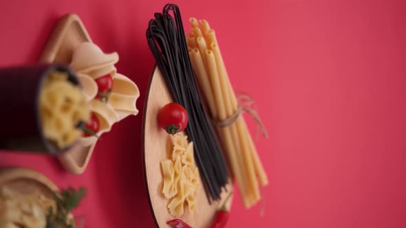 Vertical video: Pasta and spaghetti in a plate