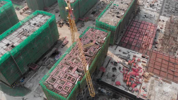 Aerial View From the Drone of a Construction Site with Cranes