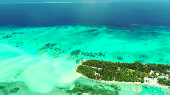 Natural overhead clean view of a white sand paradise beach and blue ocean background 