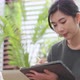 asian female adult long black hair working hand use tablet device working - VideoHive Item for Sale