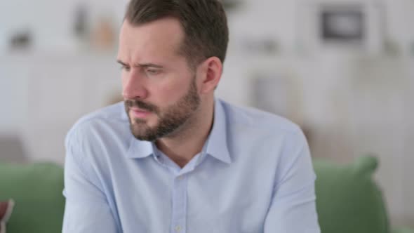 Worried Young Man Upset By Problems