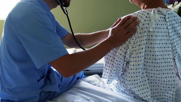 Nurse checking the patient with stethoscope