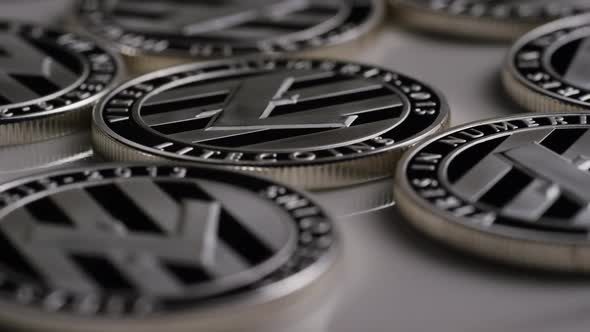 Rotating shot of Litecoin Bitcoins (digital cryptocurrency) - BITCOIN LITECOIN 0103