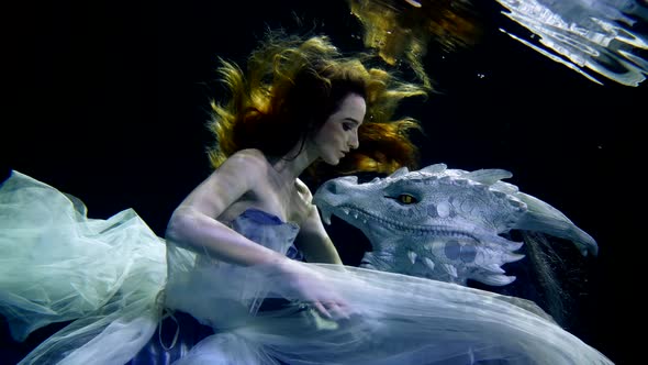 Beautiful Bride and Scary Dragon Underwater Princess is Playing with Fairytale Monster Slow Motion