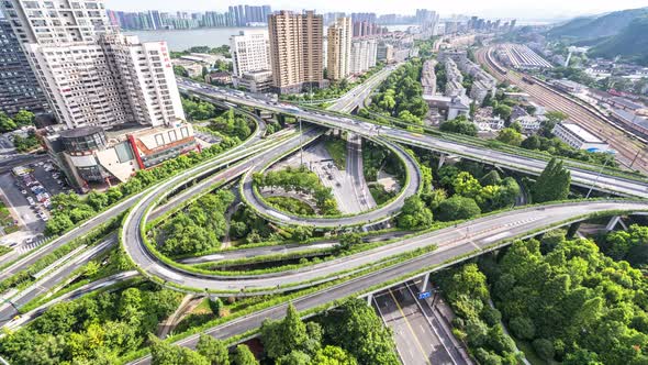 Timelapse of busy traffic road with modern office building in hangzhou china