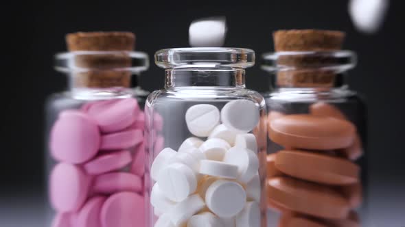 Colorful Pills in Bottles