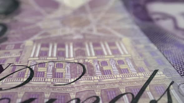 Fifty British Pound Paper Banknote in Close Up Macro View Dolly Shot