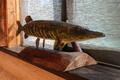 Carved wooden fish pike on a stand. DIY concept. - PhotoDune Item for Sale