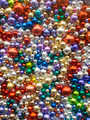 Abstract image of lots of colorful glittery balls and speheres. Background for holiday or party - PhotoDune Item for Sale