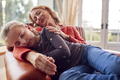 Grandmother And Granddaughter Having Daytime Sleep In Lounge At Home Together - PhotoDune Item for Sale
