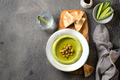 A plate of green hummus with pita bread and fresh vegetables, copy space - PhotoDune Item for Sale