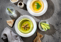 Green hummus and yellow hummus on a plates with vegetables - PhotoDune Item for Sale