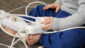 Closeup of little baby boy inserting electric plug. CHild playing with wires and cables. - PhotoDune Item for Sale