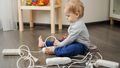 Little baby boy playing with electric cables and wires. CHild in danger. Unsafe situation - PhotoDune Item for Sale
