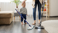 Little baby boy helping his mother doing cleanup at house - PhotoDune Item for Sale