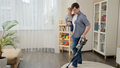 Young single father doing housework and cleanup with his little baby son - PhotoDune Item for Sale