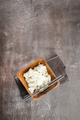 Bowl of boiled rice and sticks on dark table - PhotoDune Item for Sale