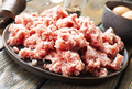 Raw mince lamb, ground mutton meat with herbs on a plate. - PhotoDune Item for Sale