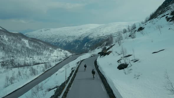 Drone Shot of Professional Road Cyclists in Winter
