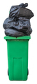 Overflowing Green Trash Bin - PhotoDune Item for Sale