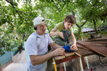 Father and son building tree house - PhotoDune Item for Sale