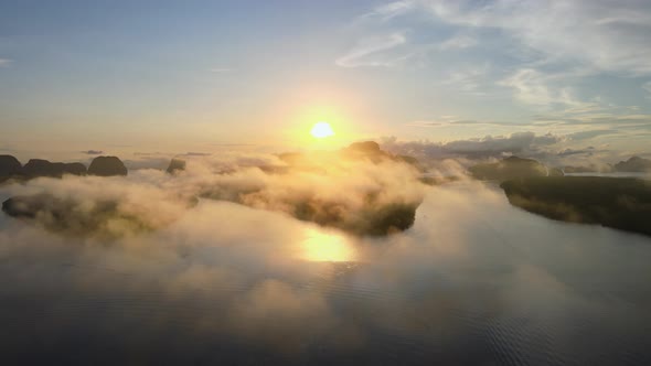 Aerial view in perspective of sunset sunrise. Over river and misty cloud in river mountain and sky