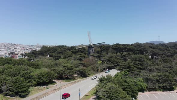 Low push-in aerial shot of the Dutch Windmill in Golden Gate Park, San Francisco. 4K