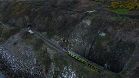 Aerial view of the train passing through the tunnels of The Bray mountains