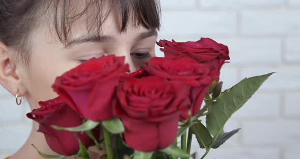 Pretty Teen Face in Flowers